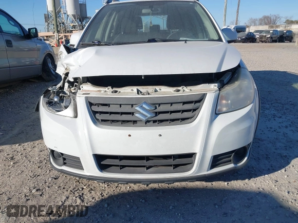 2013 Suzuki SX4 Crossover z VIN JS2YB5A39D6101193, wystawiony jako IAAI lot #41675796 z przebiegiem 87 459 mil mil oraz . Historia ofert i sprzedaży dostępna na DreamBid. Obrazek 13.