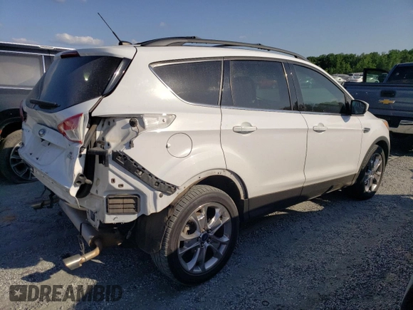 2014 Ford Escape SE with VIN 1FMCU9GX1EUC89846, listed as a Copart auction lot 56138545 with 107,455 mi miles and Salvage title. Bid and sale history available at DreamBid. Image 3.