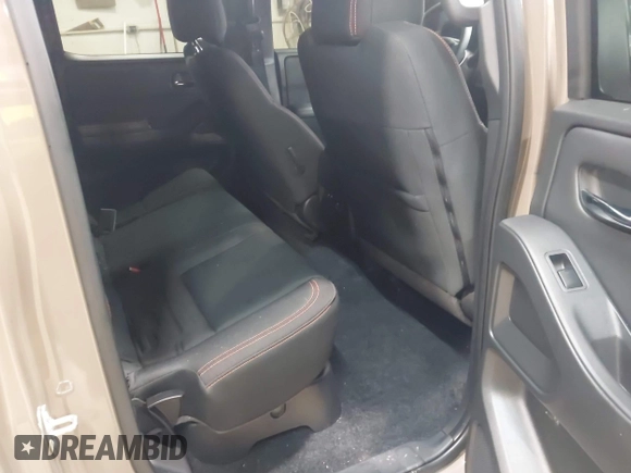 2024 Nissan Frontier SV with VIN 1N6ED1EK8RN613989, listed as a IAAI auction lot 42310148 with 14,202 mi miles and . Bid and sale history available at DreamBid. Image 8.