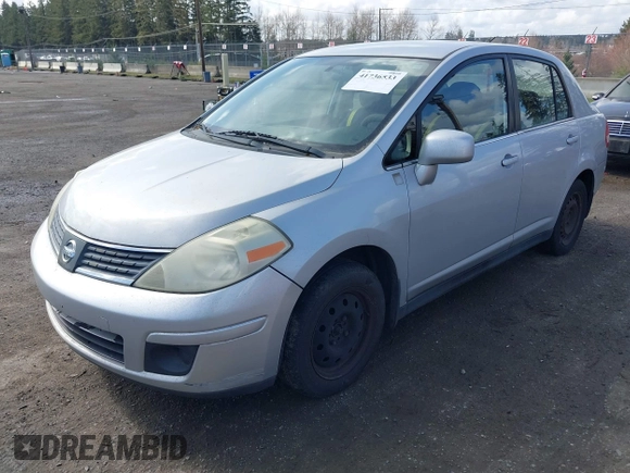 2009 Nissan Versa 1.8 S with VIN 3N1BC11E19L375222, listed as a IAAI auction lot 41736533 with 197,946 mi miles. Bid and sale history available at carsss.com. Image 2.