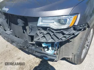 2017 Jeep Grand Cherokee Summit with VIN 1C4RJFJT9HC759417, listed as a IAAI auction lot 42199460 with 129,113 mi miles and . Bid and sale history available at DreamBid. Image 6.