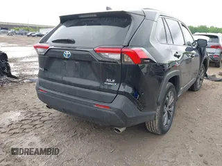 2023 Toyota RAV4 Hybrid XLE Premium with VIN 4T3B6RFV6PU126643, listed as a IAAI auction lot 42324990 with 31,491 mi miles and . Bid and sale history available at DreamBid. Image 4.
