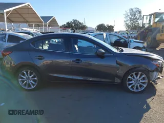 2014 Mazda 3 S Grand Touring with VIN JM1BM1W36E1112033, listed as a IAAI auction lot 41412655 with 115,050 mi miles and . Bid and sale history available at DreamBid. Image 13.