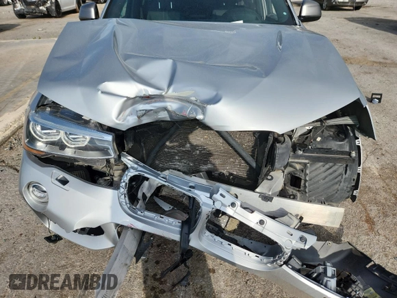 2017 BMW X4 M40i with VIN 5UXXW7C36H0U26510, listed as a Copart auction lot 62700515 with Not provided miles and Salvage title. Bid and sale history available at DreamBid. Image 12.