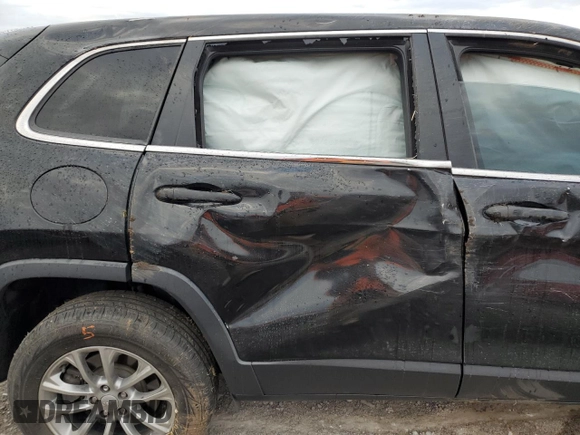 2019 Jeep Cherokee Latitude Plus with VIN 1C4PJMLBXKD214974, listed as a Copart auction lot 49877595 with 120,979 mi miles and Salvage title. Bid and sale history available at DreamBid. Image 11.