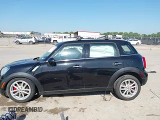2015 MINI Countryman with VIN WMWZB3C54FWM33074, listed as a IAAI auction lot 42094992 with 86,704 mi miles and . Bid and sale history available at DreamBid. Image 15.