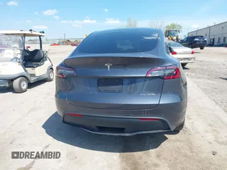 2022 Tesla Model Y Long Range with VIN 7SAYGDEE3NA007737, listed as a IAAI auction lot 42128359 with 42,597 mi miles and . Bid and sale history available at carsss.com. Image 17.
