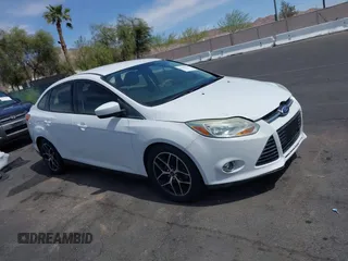 2012 Ford Focus SE with VIN 1FAHP3F24CL462319, listed as a IAAI auction lot 41981509 with 124,831 mi miles. Bid and sale history available at carsss.com. Image 13.
