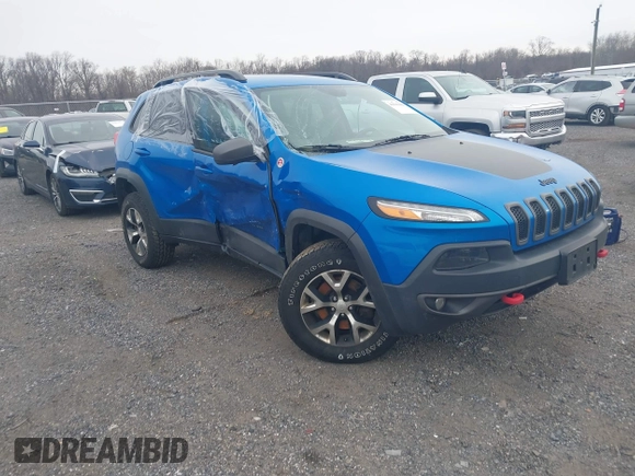 2018 Jeep Cherokee Trailhawk with VIN 1C4PJMBX2JD570976, listed as a IAAI auction lot 41610469 with 151,255 mi miles. Bid and sale history available at carsss.com. Image 1.