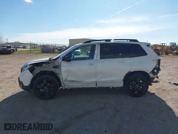 2019 Honda Passport Elite z VIN 5FNYF8H0XKB001472, wystawiony jako IAAI lot #42143890 z przebiegiem 98 119 mil mil oraz . Historia ofert i sprzedaży dostępna na DreamBid. Obrazek 15.