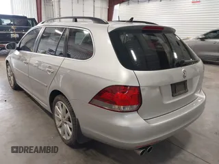 2012 Volkswagen Jetta SportWagen TDI with VIN 3VWML7AJ4CM668312, listed as a IAAI auction lot 41998809 with 130,866 mi miles. Bid and sale history available at carsss.com. Image 3.