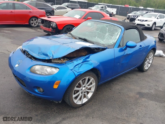 2006 Mazda MX-5 Miata Touring with VIN JM1NC25FX60102209, listed as a IAAI auction lot 41940771 with 165,003 mi miles. Bid and sale history available at carsss.com. Image 17.