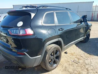 2019 Jeep Cherokee Latitude Plus with VIN 1C4PJLLBXKD339287, listed as a IAAI auction lot 41216180 with 123,265 mi miles. Bid and sale history available at carsss.com. Image 4.