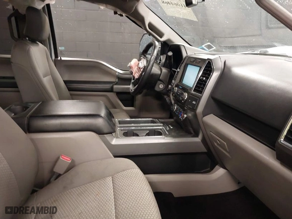 2015 Ford F-150 XLT w/HD Payload Pkg with VIN 1FTFW1EF8FKF09732, listed as a IAAI auction lot 41064468 with 105,340 mi miles. Bid and sale history available at carsss.com. Image 5.