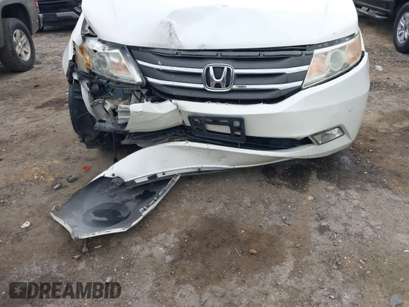 2012 Honda Odyssey Touring with VIN 5FNRL5H93CB034485, listed as a IAAI auction lot 42304502 with 198,589 mi miles and . Bid and sale history available at DreamBid. Image 6.