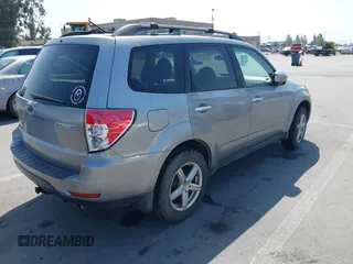 2009 Subaru Forester X with VIN JF2SH63669H716034, listed as a IAAI auction lot 42432811 with 192,094 mi miles and . Bid and sale history available at DreamBid. Image 4.