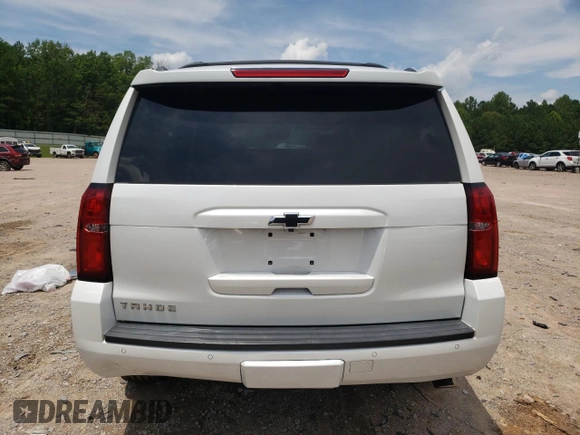 2020 Chevrolet Tahoe LT z VIN 1GNSKBKC8LR179112, wystawiony jako Copart lot #60348185 z przebiegiem 113 673 mil mil oraz Szkoda całkowita • Salvage title. Historia ofert i sprzedaży dostępna na DreamBid. Obrazek 6.