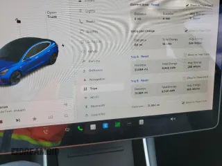 2020 Tesla Model 3 Long Range with VIN 5YJ3E1EB0LF664562, listed as a Copart auction lot 50484355 with 31,884 mi miles and Salvage Title. Bid and sale history available at carsss.com. Image 9.