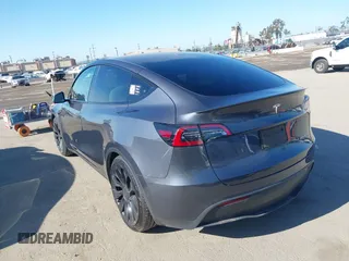 2022 Tesla Model Y Performance z VIN 7SAYGDEF2NF490794, wystawiony jako IAAI lot #42218742 z przebiegiem 41 402 mil mil oraz . Historia ofert i sprzedaży dostępna na DreamBid. Obrazek 3.