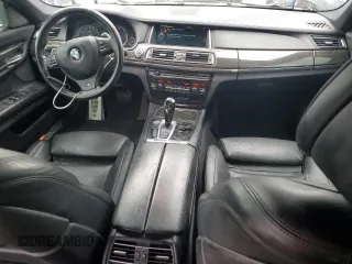 2014 BMW 7 Series 750i xDrive with VIN WBAYB6C56ED224880, listed as a Copart auction lot 72554084 with 115,146 mi miles and Salvage Title. Bid and sale history available at carsss.com. Image 8.