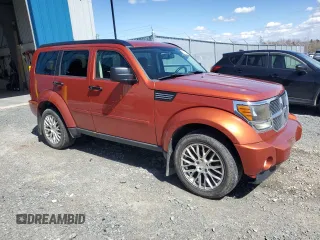 2007 Dodge Nitro SLT z VIN 1D8GU58K07W723331, wystawiony jako Copart lot #55169295 z przebiegiem 242 670 mil mil oraz Czysty tytuł • Clean title. Historia ofert i sprzedaży dostępna na DreamBid. Obrazek 4.