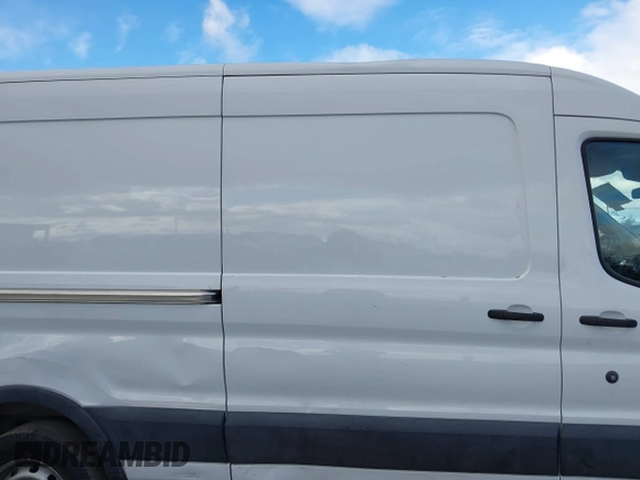 2018 Ford Transit with VIN 1FTBW2CM2JKA88329, listed as a IAAI auction lot 41768071 with 76,796 mi miles and . Bid and sale history available at DreamBid. Image 13.