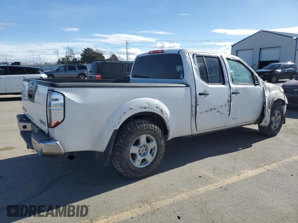 2007 Nissan Frontier SE with VIN 1N6AD09W47C404666, listed as a Copart auction lot 48812115 with 208,063 mi miles and Salvage title. Bid and sale history available at DreamBid. Image 3.