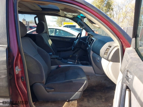 2005 Toyota 4Runner SR5 with VIN JTEBU14R258052004, listed as a IAAI auction lot 40916196 with 189,185 mi miles. Bid and sale history available at carsss.com. Image 5.