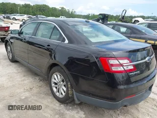 2014 Ford Taurus SE z VIN 1FAHP2D81EG140072, wystawiony jako IAAI lot #42124900 z przebiegiem 116 560 mil mil oraz . Historia ofert i sprzedaży dostępna na DreamBid. Obrazek 3.