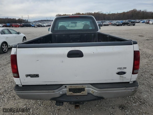 1999 Ford F-150 Work Series with VIN 1FTRF17W1XNA20017, listed as a Copart auction lot 84550234 with 0 mi miles and Salvage Title. Bid and sale history available at carsss.com. Image 6.