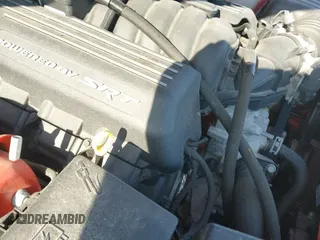 2022 Dodge Challenger R/T Scat Pack Widebody z VIN 2C3CDZFJ3NH254704, wystawiony jako IAAI lot #42648108 z przebiegiem 14 405 mil mil oraz . Historia ofert i sprzedaży dostępna na DreamBid. Obrazek 18.