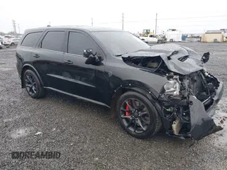 2021 Dodge Durango SRT Hellcat with VIN 1C4SDJH95MC643177, listed as a IAAI auction lot 41007139 with 31,650 mi miles and . Bid and sale history available at DreamBid. Image 1.