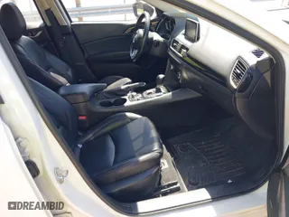 2016 Mazda Mazda3 i Grand Touring with VIN JM1BM1X79G1319469, listed as a IAAI auction lot 41929229 with 121,883 mi miles. Bid and sale history available at carsss.com. Image 5.