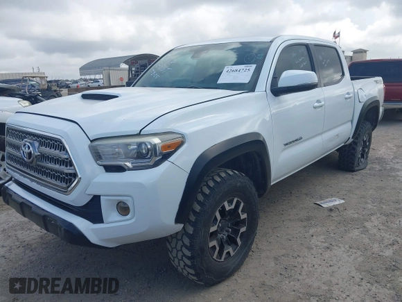 2018 Toyota Tacoma SR with VIN 3TMCZ5AN6JM138747, listed as a IAAI auction lot 42684725 with 144,725 mi miles and . Bid and sale history available at DreamBid. Image 2.