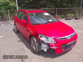2010 Hyundai Elantra Touring SE with VIN KMHDC8AE2AU075841, listed as a IAAI auction lot 40128211 with 173,541 mi miles. Bid and sale history available at carsss.com. Image 1.