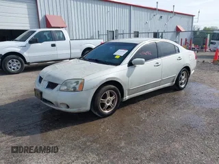 2004 Mitsubishi Galant ES z VIN 4A3AB36F14E132394, wystawiony jako IAAI lot #41946982 z przebiegiem 167 162 mil mil oraz . Historia ofert i sprzedaży dostępna na DreamBid. Obrazek 2.