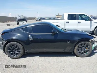 2019 Nissan 370Z Sport Touring with VIN JN1AZ4EH1KM420719, listed as a IAAI auction lot 42096816 with 97,803 mi miles and . Bid and sale history available at DreamBid. Image 14.