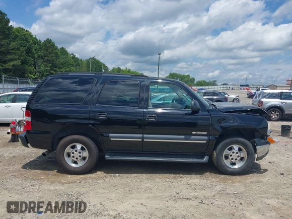 2003 Chevrolet Tahoe LS with VIN 1GNEC13V03R315463, listed as a IAAI auction lot 42518427 with 155,629 mi miles and . Bid and sale history available at DreamBid. Image 14.