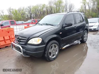 2001 Mercedes-Benz M-Class with VIN 4JGAB72E41A275216, listed as a IAAI auction lot 41953087 with 243,589 mi miles. Bid and sale history available at carsss.com. Image 17.