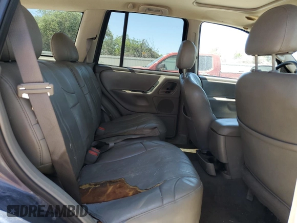 2004 Jeep Grand Cherokee Laredo z VIN 1J4GX48N54C371073, wystawiony jako Copart lot #52202855 z przebiegiem 212 368 mil mil oraz Szkoda całkowita • Salvage title. Historia ofert i sprzedaży dostępna na DreamBid. Obrazek 10.