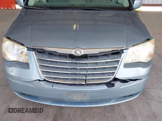 2010 Chrysler Town & Country Touring z VIN 2A4RR5D10AR500903, wystawiony jako IAAI lot #41976476 z przebiegiem 219 230 mil mil oraz . Historia ofert i sprzedaży dostępna na DreamBid. Obrazek 6.
