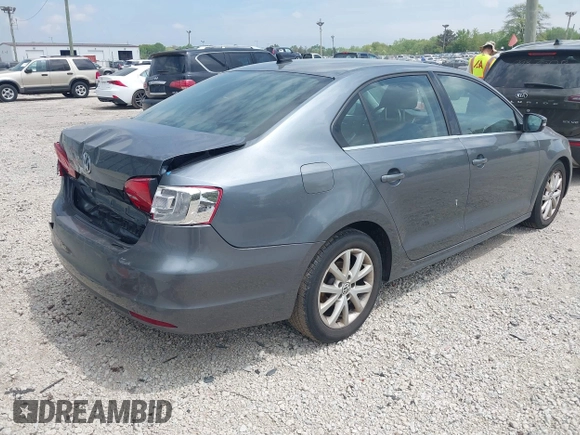 2013 Volkswagen Jetta SE with VIN 3VWDX7AJXDM255977, listed as a IAAI auction lot 42194447 with 120,921 mi miles and . Bid and sale history available at DreamBid. Image 4.