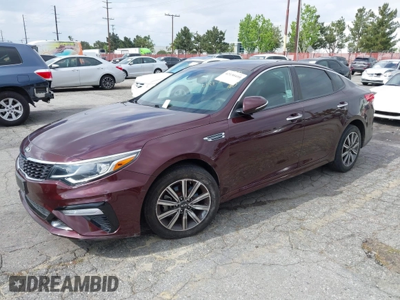 2019 Kia Optima LX z VIN 5XXGT4L37KG354649, wystawiony jako IAAI lot #42130410 z przebiegiem 61 315 mil mil oraz . Historia ofert i sprzedaży dostępna na DreamBid. Obrazek 2.