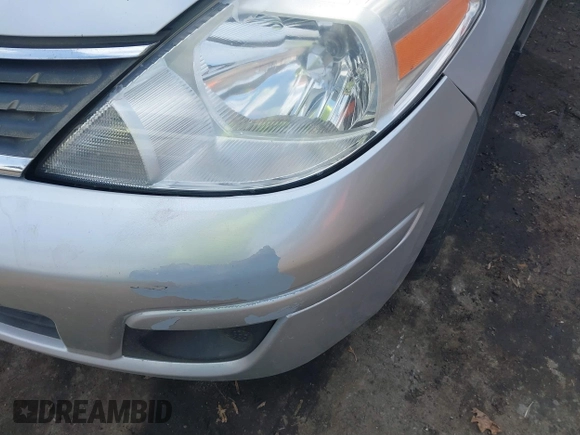 2009 Nissan Versa SL with VIN 3N1BC13E19L418874, listed as a IAAI auction lot 41698587 with 154,568 mi miles and . Bid and sale history available at DreamBid. Image 6.