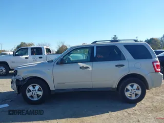 2008 Ford Escape XLT with VIN 1FMCU93158KA39754, listed as a IAAI auction lot 40660179 with 113,956 mi miles. Bid and sale history available at carsss.com. Image 14.