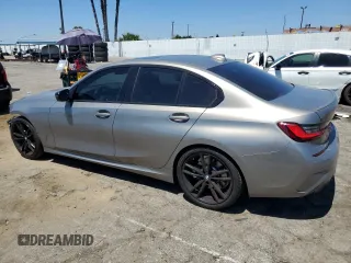 2022 BMW 3 Series 330i with VIN WBA5R1C04NFN14819, listed as a Copart auction lot 64467823 with 18,310 mi miles. Bid and sale history available at carsss.com. Image 2.