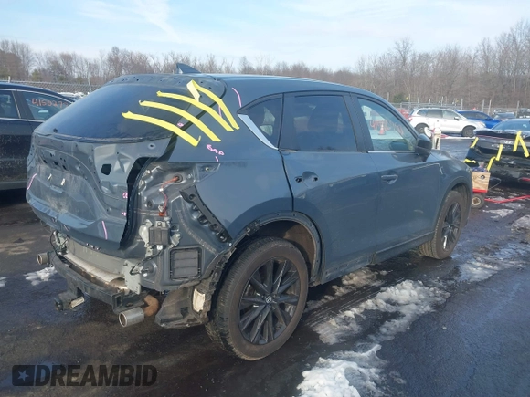 2021 Mazda CX-5 Touring z VIN JM3KFBCMXM0463469, wystawiony jako IAAI lot #41488993 z przebiegiem 28 582 mil mil oraz . Historia ofert i sprzedaży dostępna na DreamBid. Obrazek 4.