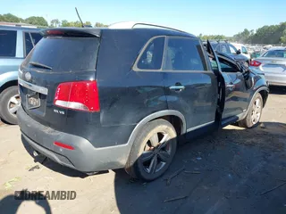 2013 Kia Sorento EX with VIN 5XYKUDA22DG412022, listed as a IAAI auction lot 40567674 with 177,189 mi miles. Bid and sale history available at carsss.com. Image 4.