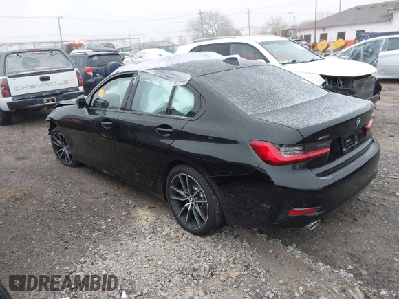 2020 BMW 3 Series 330i xDrive with VIN WBA5R7C08LFH44012, listed as a IAAI auction lot 41252675 with 57,486 mi miles. Bid and sale history available at carsss.com. Image 3.
