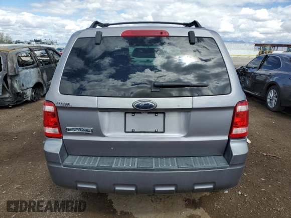 2008 Ford Escape XLT z VIN 1FMCU03148KD67100, wystawiony jako Copart lot #48525425 z przebiegiem 182 122 mil mil oraz Szkoda całkowita • Salvage title. Historia ofert i sprzedaży dostępna na DreamBid. Obrazek 6.